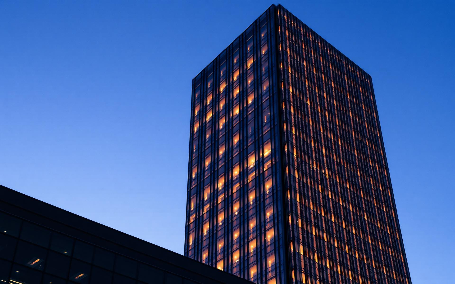 Modern corporate architecture at dusk